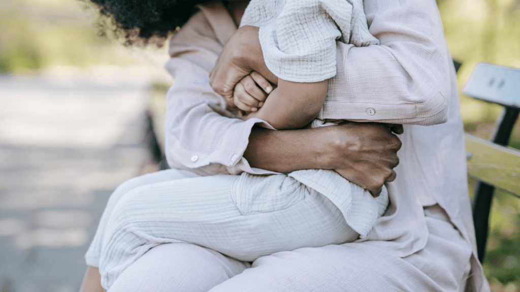 A person and child sitting