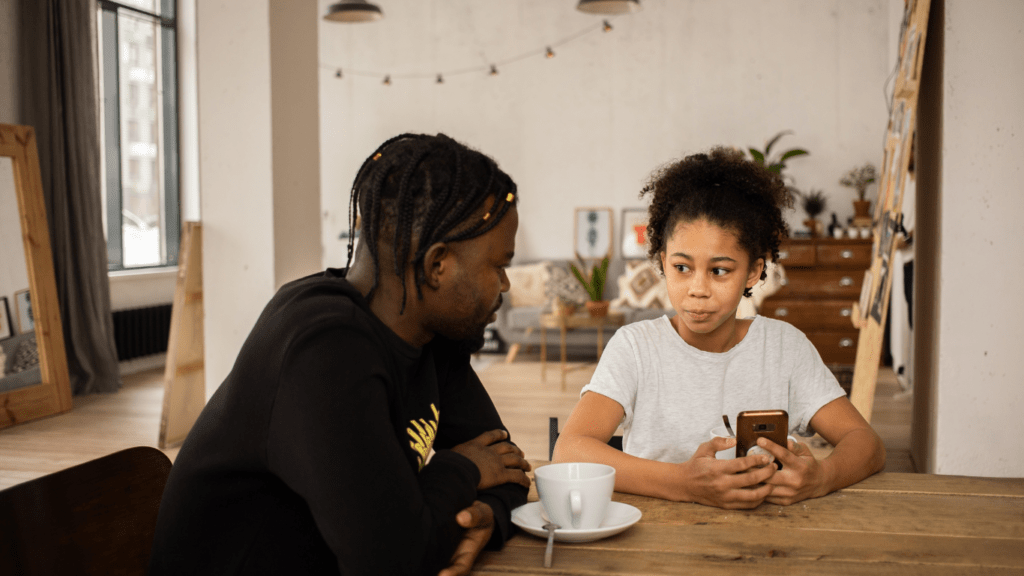 two people sitting at the table