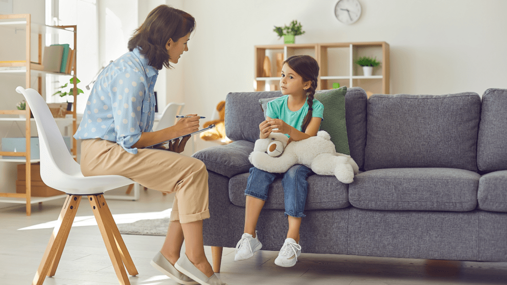 Two individuals sitting on a couch