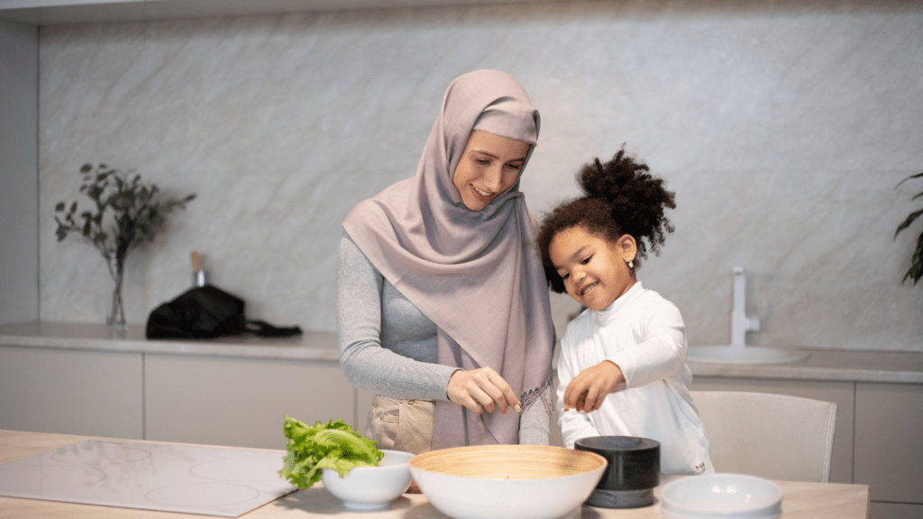 A woman and her daughter in the kitchen