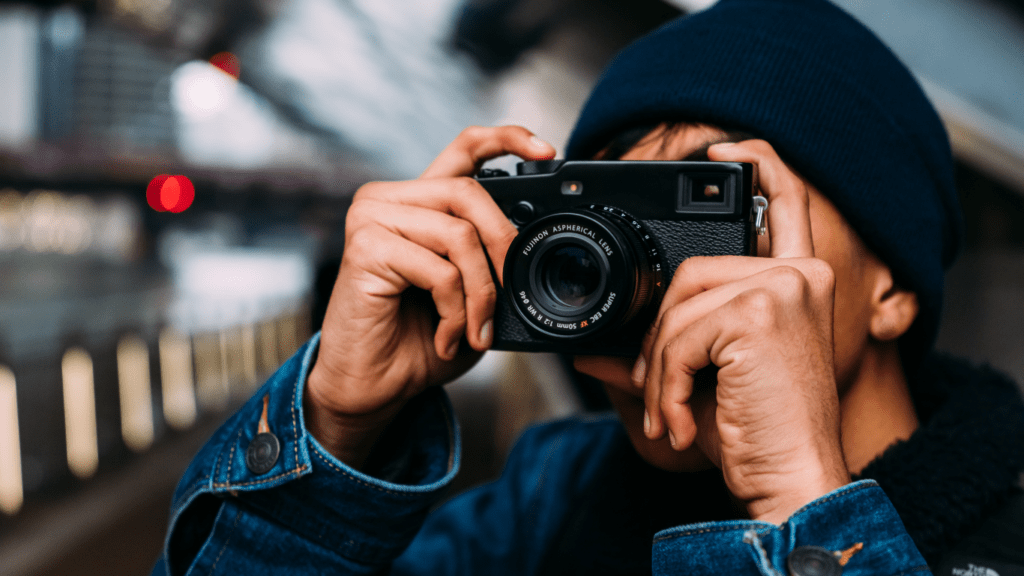 a person taking a photo with a camera