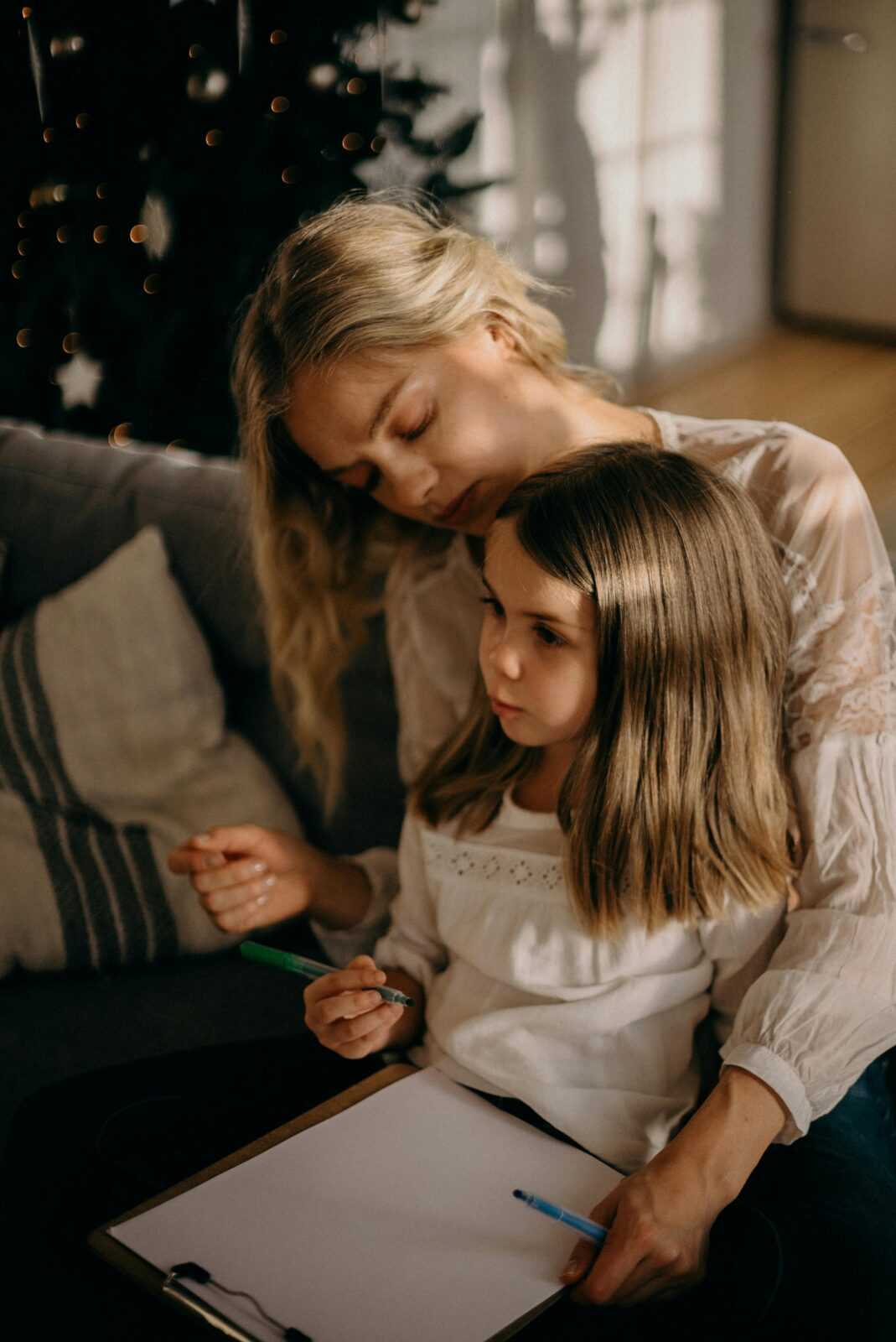 Woman Beside Girl