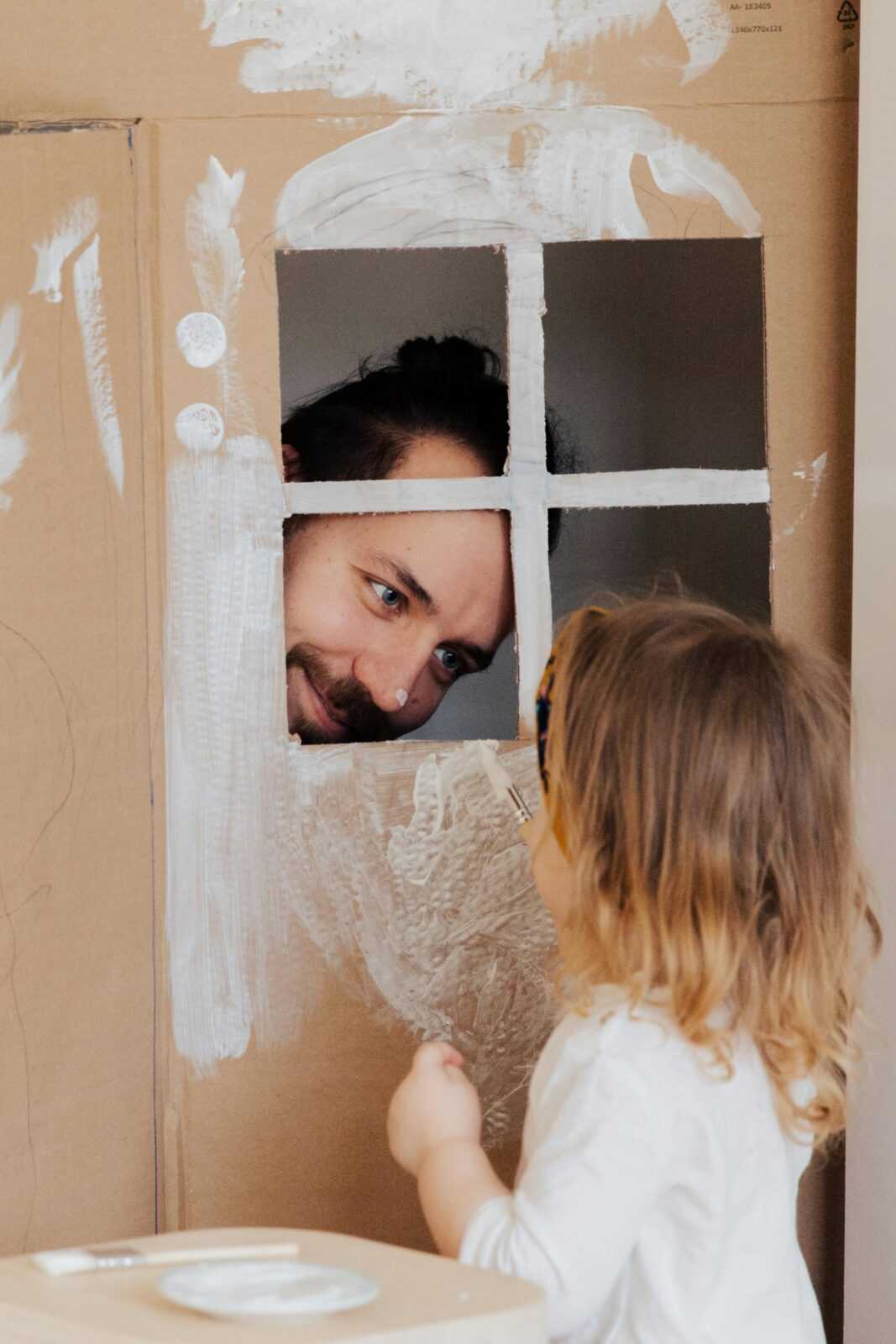 A Man Playing with his Little Daughter