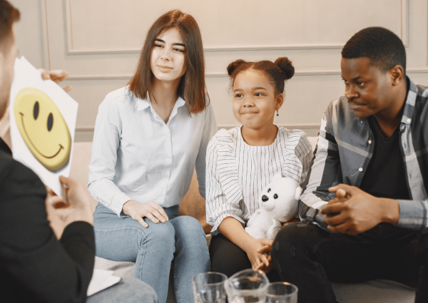 a group of people sitting on a couch